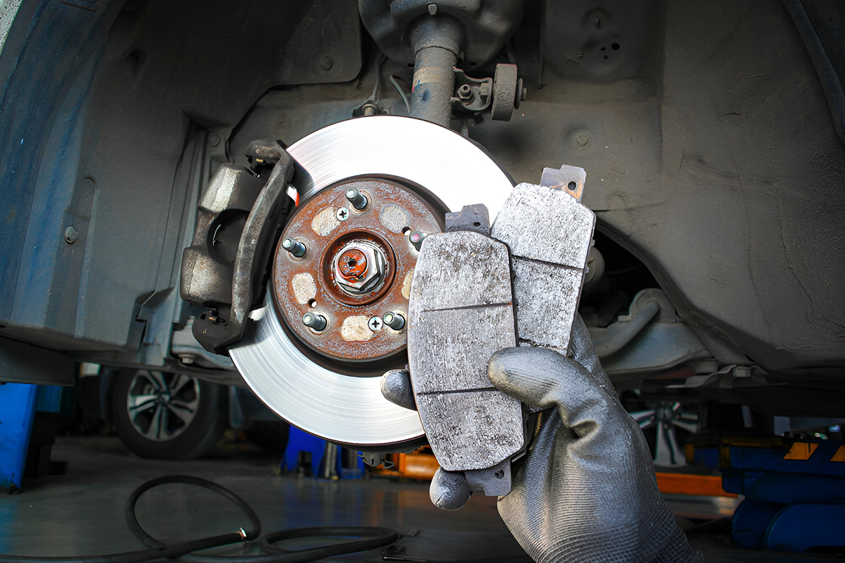 Close-up of brake rotor during a brake system inspection.