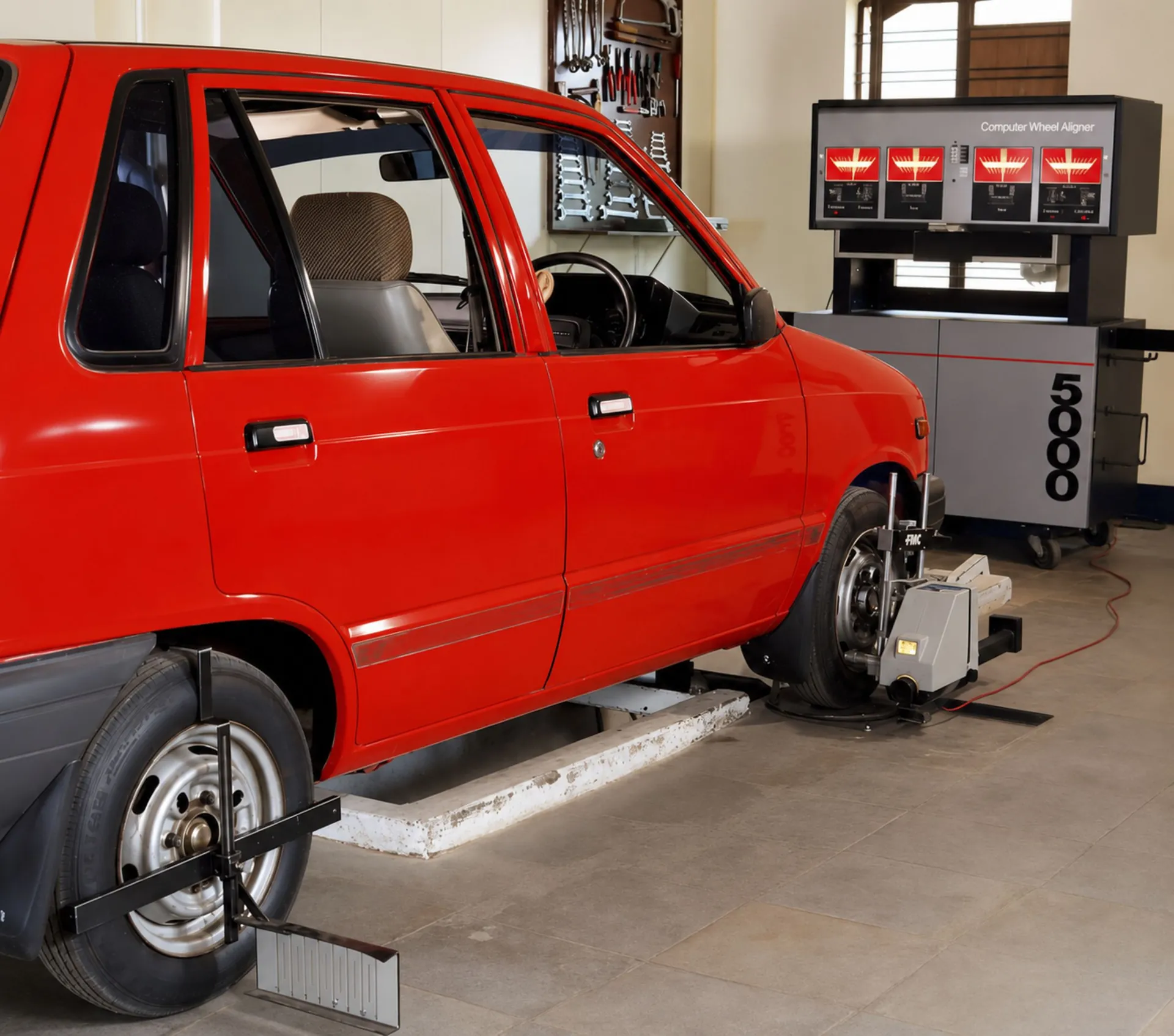 Car on a computerised wheel alignment rig